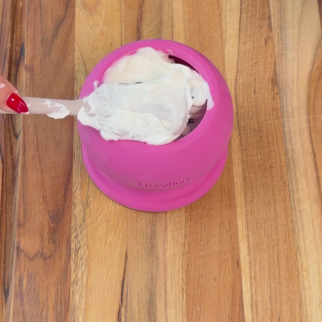 FreezBall in 8 seconds: filling it with yogurt and blueberries, putting it in the freezer, and a dog licking it